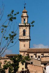 Obraz premium Bell tower over small medieval village