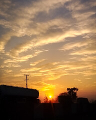 Naklejka premium sunset over the city