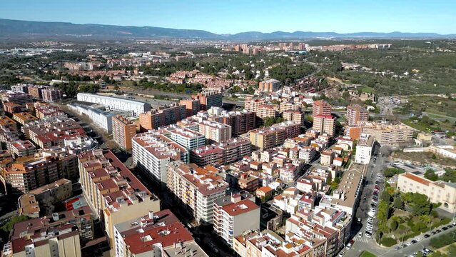 Rooftops of Tarragona. Drone passing forward above the city center. Medieval and historic city, famous for the Castells competition and festival. Sunny day. Costa Dourada, Catalonia, Spain
