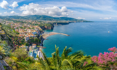 Overlook the idyllic Sorrento coastline, with sweeping views of azure waters and lush landscapes, epitomizing the charm of Italy's Amalfi Coast. - obrazy, fototapety, plakaty