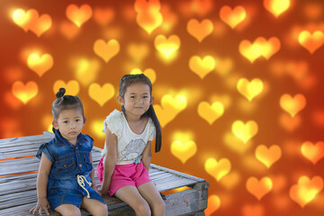 Valentine Two asian Thai girl on bokeh cute little hearts love background