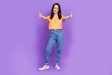 Full body photo of young administrator woman in yellow t shirt show double thumbs up respect you isolated on purple color background