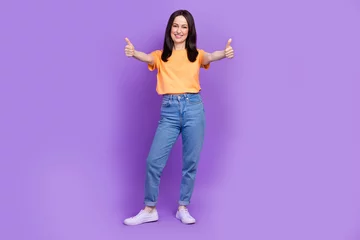 Gardinen Full body photo of young administrator woman in yellow t shirt show double thumbs up respect you isolated on purple color background © deagreez