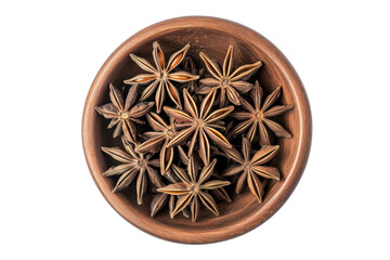 Star anise in a brown ceramic bowl isolated on transparent background.