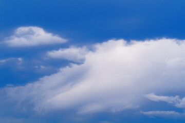 Obraz premium Cloudy sky with dark blue. Weather changes and impact on people's mood