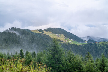 Country houses and mountain views above high mountains.. A Plateau in Camlihemsi  Rize. 
