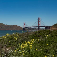 Crédence de cuisine en verre imprimé Plage de Baker, San Francisco Panoramic view of the Golden Gate Bridge viewed from Baker beach on a mostly blue sky day copy space