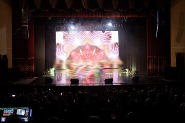 Сoncert on scene theater, stage light with colored spotlights and smoke.