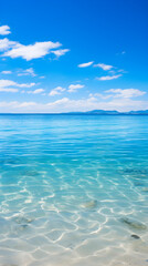 Fototapeta na wymiar Eternal Blue: A Mesmerizing Azure Waterscape Adorned by a Clear Blue Sky