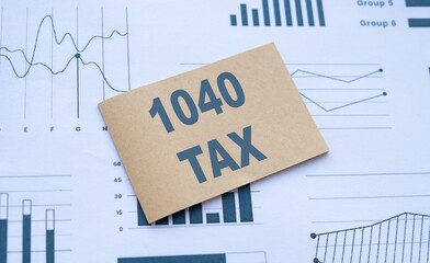 Tax Form 1040 With Financial Charts And Graphs For Economy Analysis