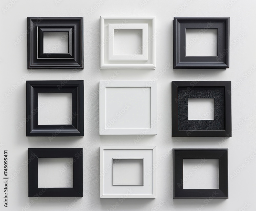 Poster a collection of black and white picture frames arranged neatly against a white backdrop, showcasing 