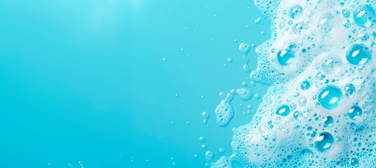 washroom background with foam and bubbles, on a blue bathroom surface, horizontal wallpaper wellnes, refreshment and cosmetics concept, copy space for text
