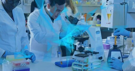 Animation of glowing light trails over diverse scientists in laboratory - Powered by Adobe