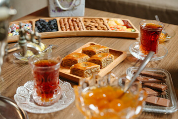 Wooden Table With Platters of Food and Drinks