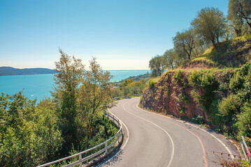 High road to Musaga, with a view over Lake Garda