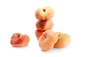 Several saturn peaches or flat peaches isolated on white background with clipping path..