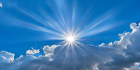 Against the background of heaven, where a bright ray of light breaks through the clo