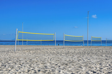 Volleyball nets in the sand of San Juan Beach in Alicante, Spain