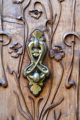 Woodwork and decoration on a entrance door, Alicante,  Spain