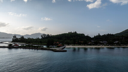 panoramic drone view of the coast of the Seychelles with bays and white catamarans