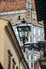 Fototapeta na wymiar Lantern in front of Cathedral of Santa Maria del Fiore (Saint Mary of the Flower) in Florence, Italy.
