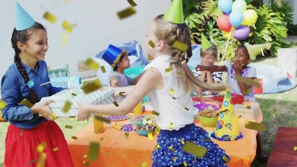 Animation of gold confetti falling over happy diverse girls fighting over present at party