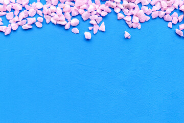 decorative pebble frame for design on blue background top view mockup
