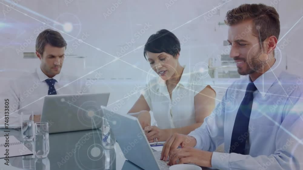 Poster animation of network of connections over diverse colleagues using laptops in office