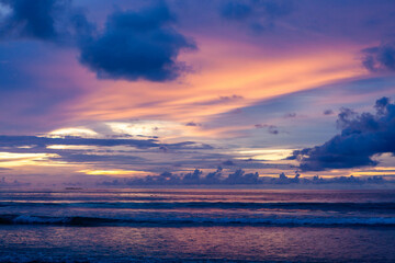 Naklejka premium Andaman Sea sunset. Colorful sky and ocean waves create a breathtaking view.