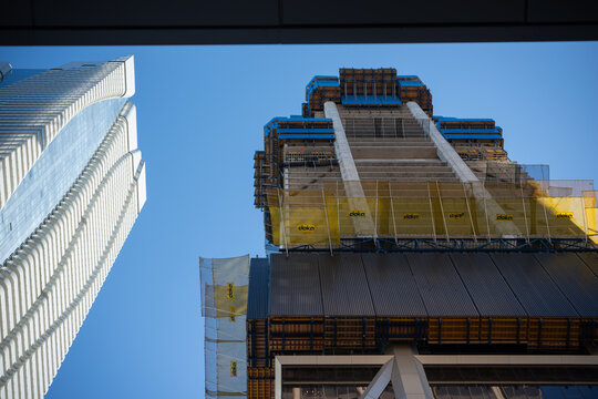 two tall towers (left) One Bloor and (right) The One both condominium complex with shopping concourse located on the south west and south east corner of Bloor and Yonge in downtown Toronto, Canada
