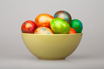 Vibrant Hand-Painted Easter Eggs in Bowl
