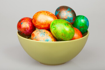 Vibrant Hand-Painted Easter Eggs in Bowl