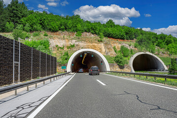 Tunnel on a highway. A tunnel in a mountain on a country highway.