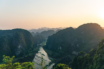 Viewpoint Đầm sen Hang múa is a popular spot for tourists visiting Tam Coc in the Ninh Binh region of Vietnam. In the background are the mountains and rice fields of the region. © Chris