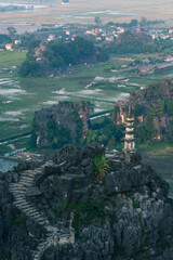 Sunset Views of of Dam sen Hang Mua in Northern Vietnam Overlooking the Ninh Binh Region of rice fields.  © Chris