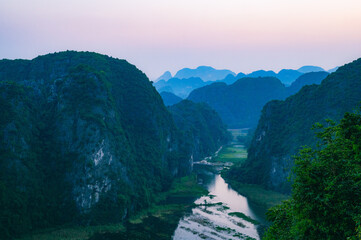Viewpoint Đầm sen Hang múa is a popular spot for tourists visiting Tam Coc in the Ninh Binh region of Vietnam. In the background are the mountains and rice fields of the region. © Chris