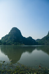 Sunset Views of of Dam sen Hang Mua in Northern Vietnam Overlooking the Ninh Binh Region of rice fields.  © Chris