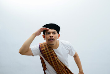 asian muslim man wear sarong confused expression