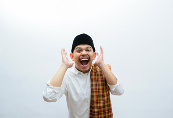 asian muslim man with skull cap shocked expression