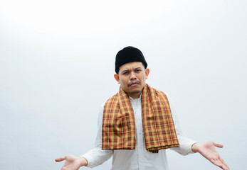 asian muslim man showing sad expression