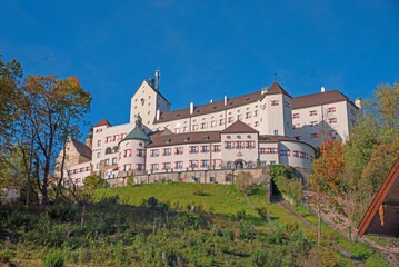 Fototapeta na wymiar Hohenaschau castle on the hilltop. blue sky. historic building bavaria