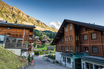 Rustic Wengen mountain village and Jungfrau mountain in summer at Switzerland