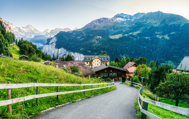 Scenery of Wengen mountain village with Lauterbrunnen valley and Jungfrau mountain in Bernese...