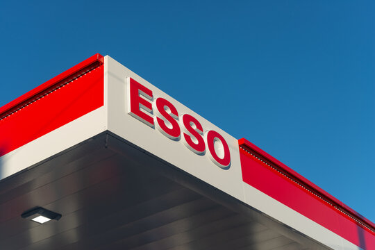 exterior sign at Esso, a gas station chain, located here at 481 Rogers Road and Old Weston Road in Toronto, Canada
