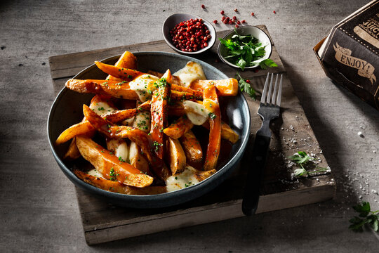 Canadian poutine (fast food specialty made from french fries, cheese, and gravy)