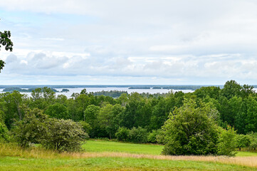 Fototapeta na wymiar Panoramic view of Lake Asnen from Hembygdsgard Lunnabacken rest area in Lunnabackens nature reserve near Ugglekull, Urshult, Smaland, Sweden