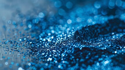 close-up of a blue-sparkling metallic pigment dust