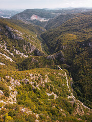 Fototapeta na wymiar Drone shot of the river's canyon in the mountains, near Uzice, Serbia