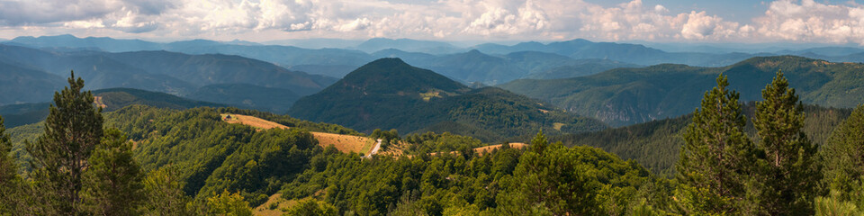 Fototapeta na wymiar Panorama on mountains, forest and cottages, Tara, Serbia