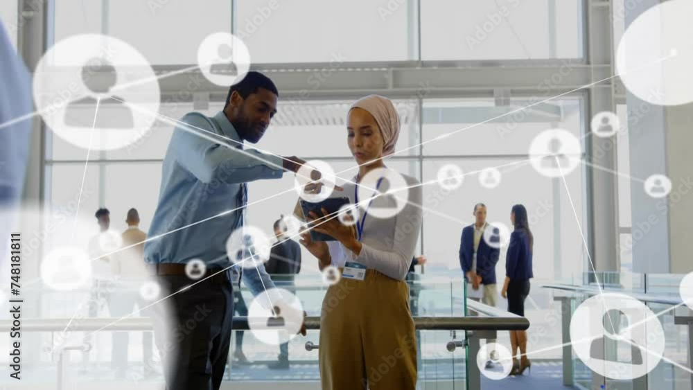 Poster animation of network of connections with icons over diverse colleagues discussing work